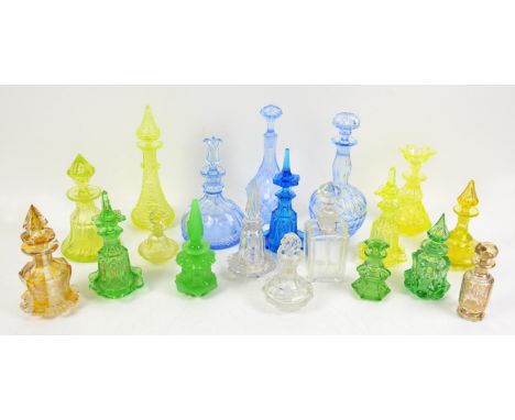 Collection of moulded glass scent bottles and stoppers, in light blue, lime green, clear glass, blue and clear glass with gil