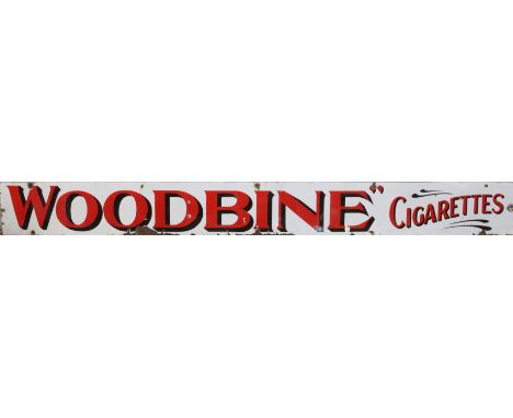 Woodbine Cigarettes enamel advertising sign, 24 x 231cm.Condition Report:  Most likely early 20th century. Significant enamel