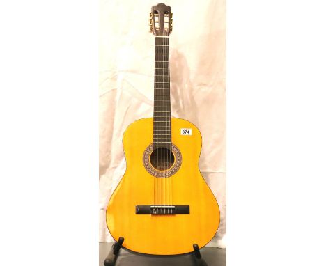 An Encore classical guitar, full size model 440ft. Not available for in-house P&amp;P, contact Paul O'Hea at Mailboxes on 019