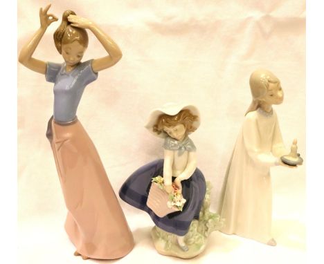 Lladro figurine girl with posy, a further Lladro girl with a chamberstick and a Nao girl, H: 26 cm. P&amp;P Group 3 (£25+VAT 