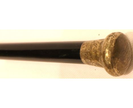 An Edwardian ebonised walking cane with silver pommel. P&amp;P Group 3 (£25+VAT for the first lot and £5+VAT for subsequent l