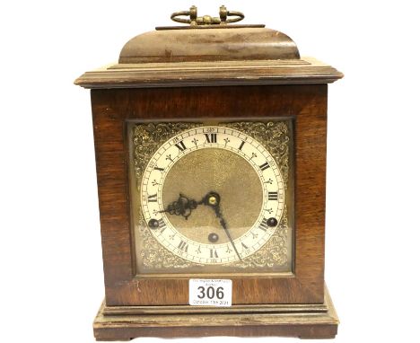 Walnut cased brass and silver faced Westminster chime mantel clock, H: 28 cm, not working at lotting, movement has dropped be