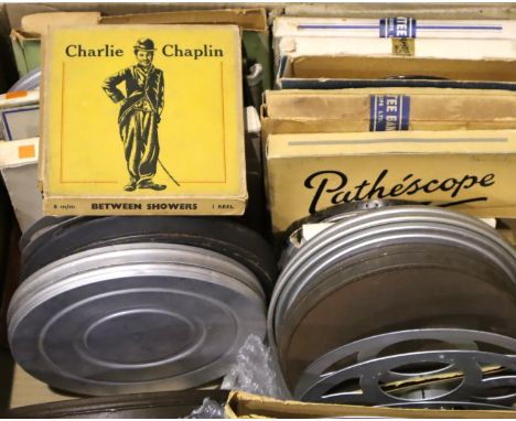 Box of twenty four 8mm and 9.5mm tape reels to include various Charlie Chaplin examples, Mickey McGuire, Walter Forde, Woody 