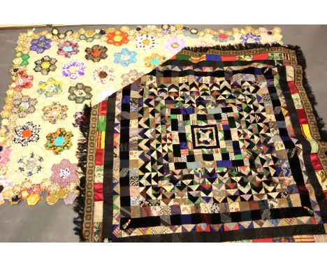 Decorative and colourful patchwork throw, lined to the back with a frill edging to the four sides and another patchwork throw