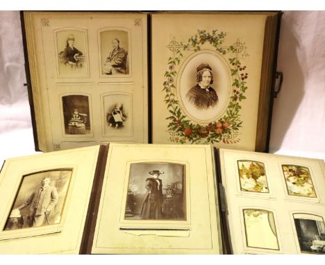 Three Victorian and Edwardian family photograph albums with contents, one lacking cover. P&amp;P Group 3 (£25+VAT for the fir