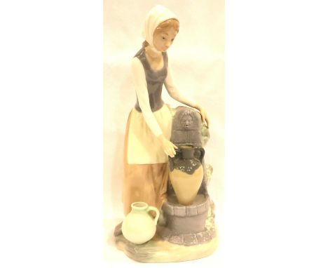 Nao figurine of a girl at a water fountain, H: 30 cm. P&amp;P Group 3 (£25+VAT for the first lot and £5+VAT for subsequent lo