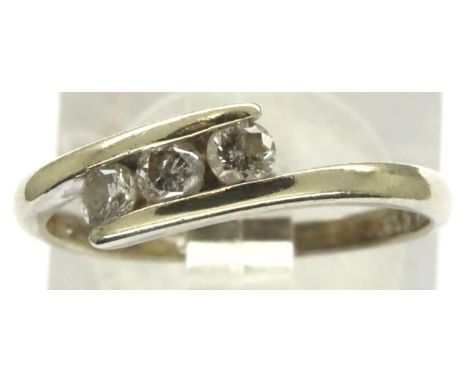 9ct white gold three stone (totalling 0.25cts) diamond crossover ring, size K, 1.8g. P&amp;P Group 1 (£14+VAT for the first l