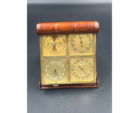 An Angelus, Foursome alligator and gilt brass desk compendium with eight day clock, triple date calendar, thermometer and bar