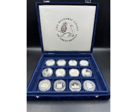 Twelve collectable silver coins celebrating the lif of the Queen Mother