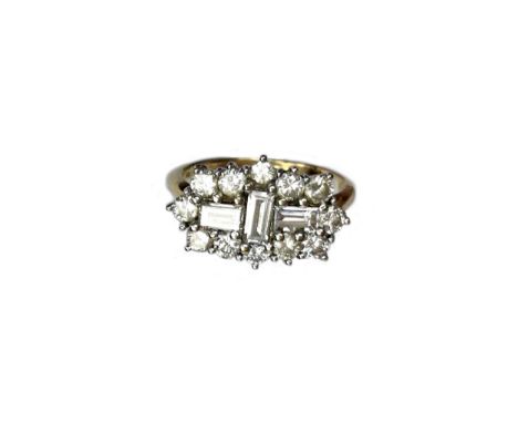 DIAMOND CLUSTER RING, set with emerald cut stones surrounded by round brilliant cut stones, the diamonds totalling approximat