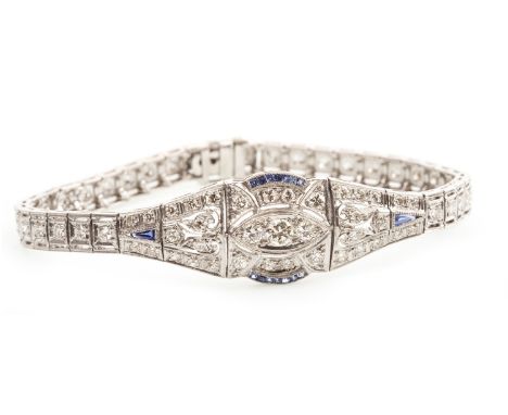 ART DECO STYLE SAPPHIRE AND DIAMOND BRACELET, the central panel set with round brilliant cut diamonds flanked by calibre and 