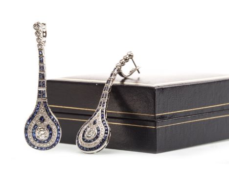 PAIR OF ART DECO STYLE SAPPHIRE AND DIAMOND EARRINGS each set with a central round brilliant cut diamond within alternating s