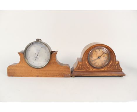 A circular brass aneroid barometer by T Wheeler, London plus an Edwardian inlaid mantel clock