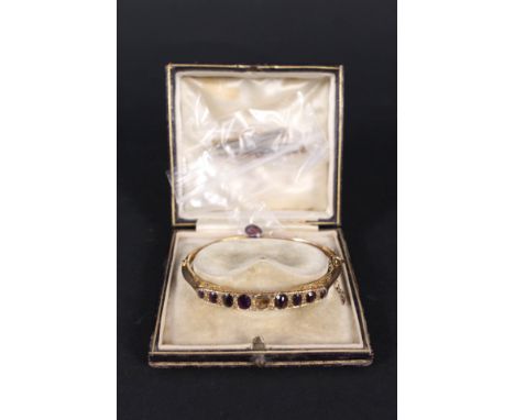 A 9ct gold amethyst and diamond set bangle (one stone is loose) plus two 9ct gold stone set bar brooches