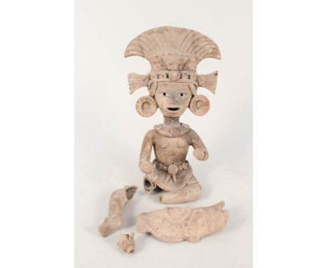 An Aztec style pottery figure (as found) plus a plaque