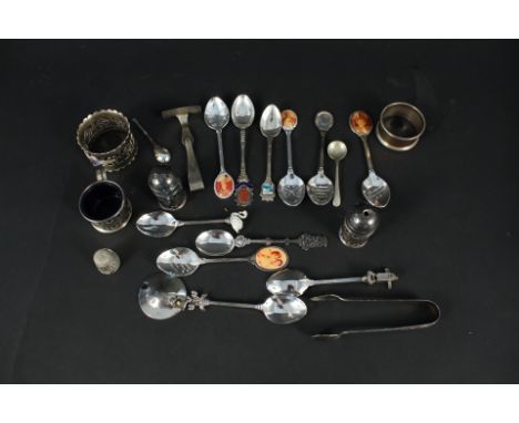 A silver napkin ring, two silver souvenir spoons, a silver pusher and a quantity of silver plated items including napkin ring