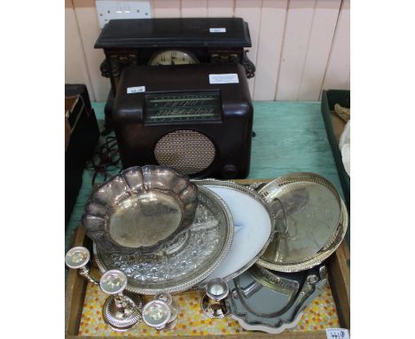 An ebonised mantel clock, Bush Bakelite mains radio (this item is sold as a collectors item only and has not been subject to 