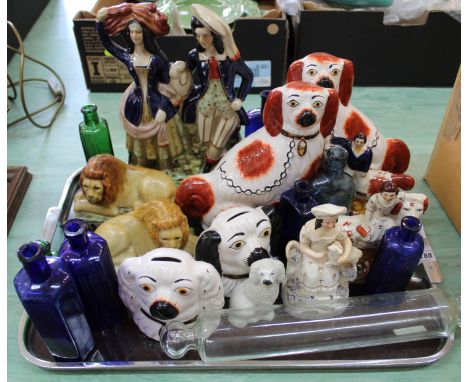 A Victorian Staffordshire shepherdess and a sheep, various reproduction Staffordshire figures and animals plus bottles and a 