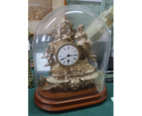 A gilt metal figure decorated mantel clock under glass dome, dome height 13"