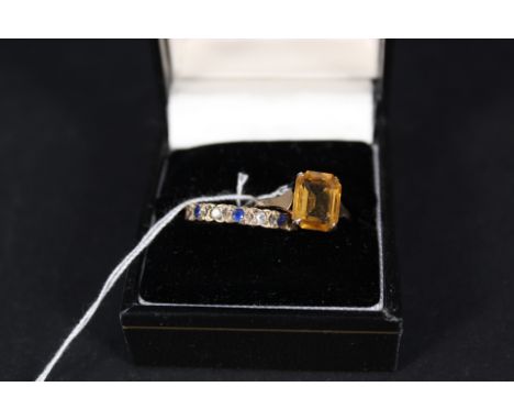 A 9ct gold paste set half eternity ring plus a 9ct gold citrine set ring