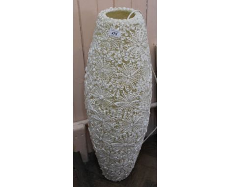 A decorative floral table lamp