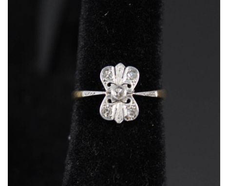 An 18ct gold platinum set diamond ring, size O