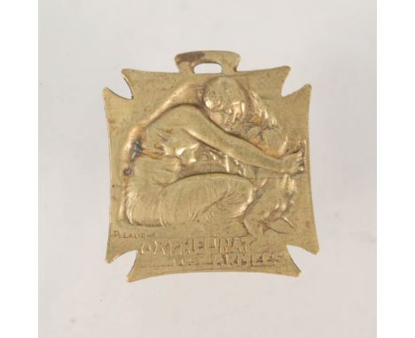 A Lalique brass plaque marked Orphelinat Des Armees (produced in 1915 as part of The War Effort)