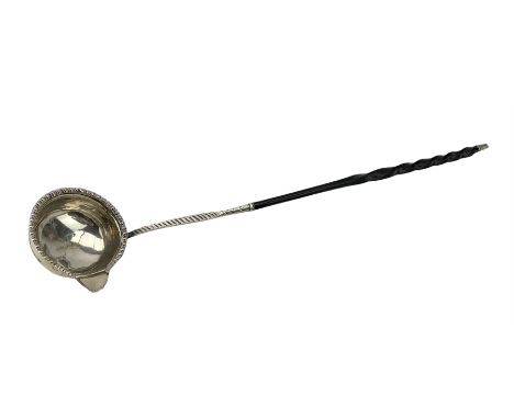 Georgian silver toddy ladle with engraved stem and twisted whalebone handle, marks rubbed