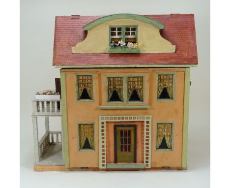 A Moritz Gottschalk model 6312 dolls house with garden, German 1927, the painted brown and green exterior with painted front 