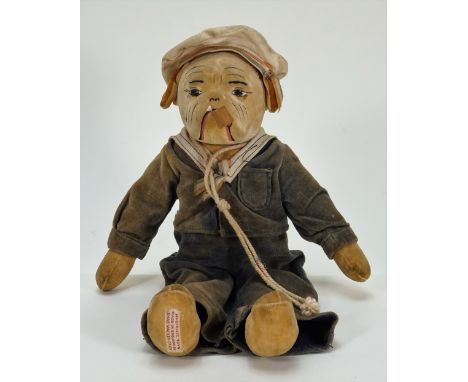 A Chad Valley  bulldog in sailor costume, 1930s, the cream velvet dog with brown ears, moulded and printed features and woode