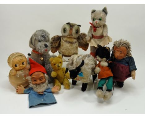 Collection of German soft toys, 1950s, Steiff Gucki Dwarf with rubber face, mohair Snucki Ram, (both lack buttons) large Owl 