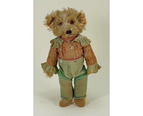 Rare Merrythought ‘Bingie’ dressed Teddy bear, English 1930s, the light brown mohair head and paws, with orange glass eyes, b