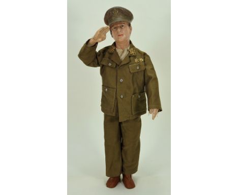 A General Douglas MacArthur portrait doll, probably by Freundlich American circa 1942, with moulded and painted composition h