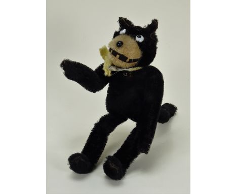 A Dean’s Rag Book Felix the Cat, circa 1930, the black mohair cat with white muzzle, enamel eyes, toothy grin and button nose