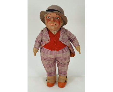 A rare Dean’s Rag Book A.1 Character cloth doll, 1920s, the pressed and painted face with hook nose and protruding chin and h