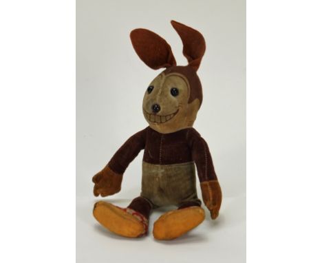 A Dean’s Rag Book Oswold the Lucky Rabbit, 1932-34, the brown and cream printed velvet rabbit with black boot button eyes, br