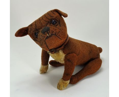 A rare Steiff Bulldog, circa 1909, the russet brown burlap dog with white mohair chest and front paws, black boot button eyes