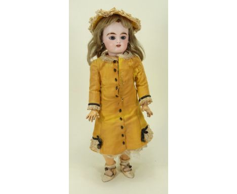 A Francois Gauthier bisque head Bebe doll, French circa 1890, pale bisque head with fixed blue glass paper weight eyes, paint