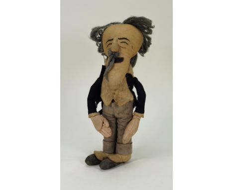 A rare Chad Valley Ramsay MacDonald P.M cloth doll, circa 1925, the brushed cotton head with printed features, grey wool hair