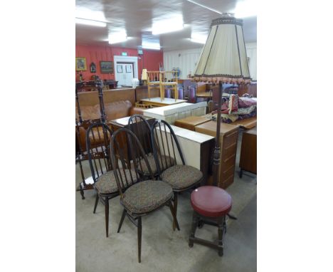 A drop-leaf table, a set of four beech chairs, a stool and a standard lamp