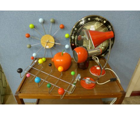 A 1960's desk lamp, a circular mirror, an ice box, a jar, a vintage style desk lamp, coat hooks and a clock