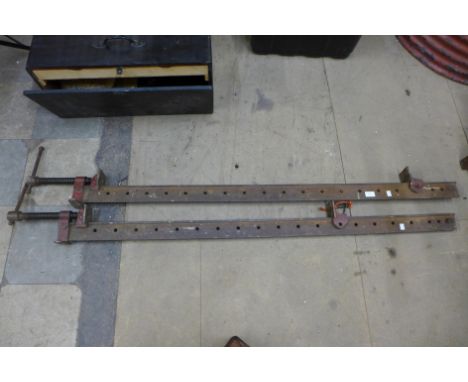 Two cast iron sash clamps