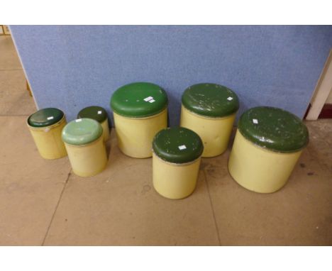 Eight vintage enamelled tins