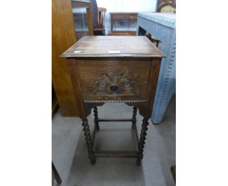 An oak barley twist sewing box on stand