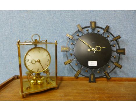 A Smiths electric wall clock and a Kundo anniversary clock