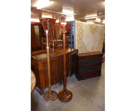 An Art Deco oak sideboard, Globe Wernicke two tier stacking bookcase, beech chair and two standard lamps