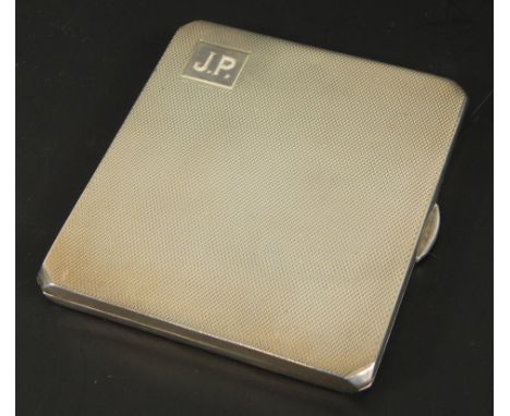 A George V silver cigarette case, with engine turned design body, with initials JP, Birmingham 1933, 3oz gross.  (M)