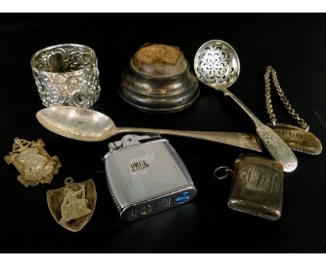 A collection of small silver etc., to include a silver Madeira decanter label, an embossed silver decanter, a silver mounted 