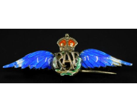 A silver and enamel RAF brooch, with blue wings, red crown, and green crest, (AF), 4.3g all in.  (M)
