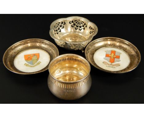 Four silver trinket items, comprising two crested ware pin dishes for Lincoln & Scarborough with silver borders, Birmingham 1